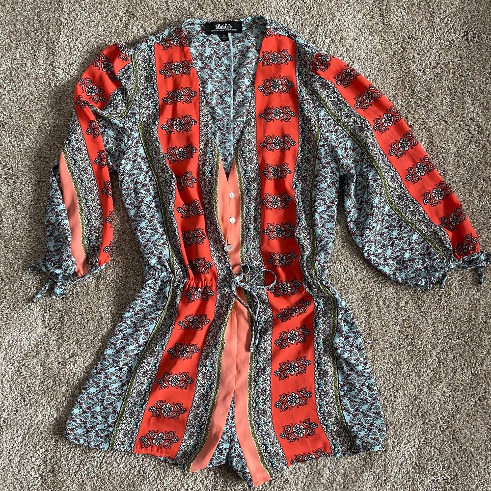 LuLu's Romper (Medium), but fits like a small.